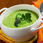 Broccoli cream soup on a tablecloth